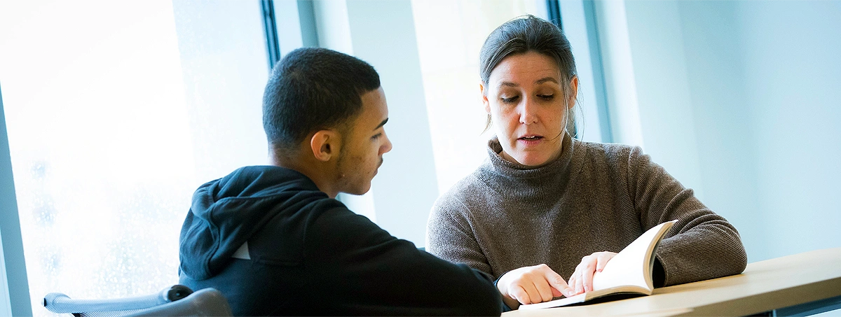 Student with Teacher studying
